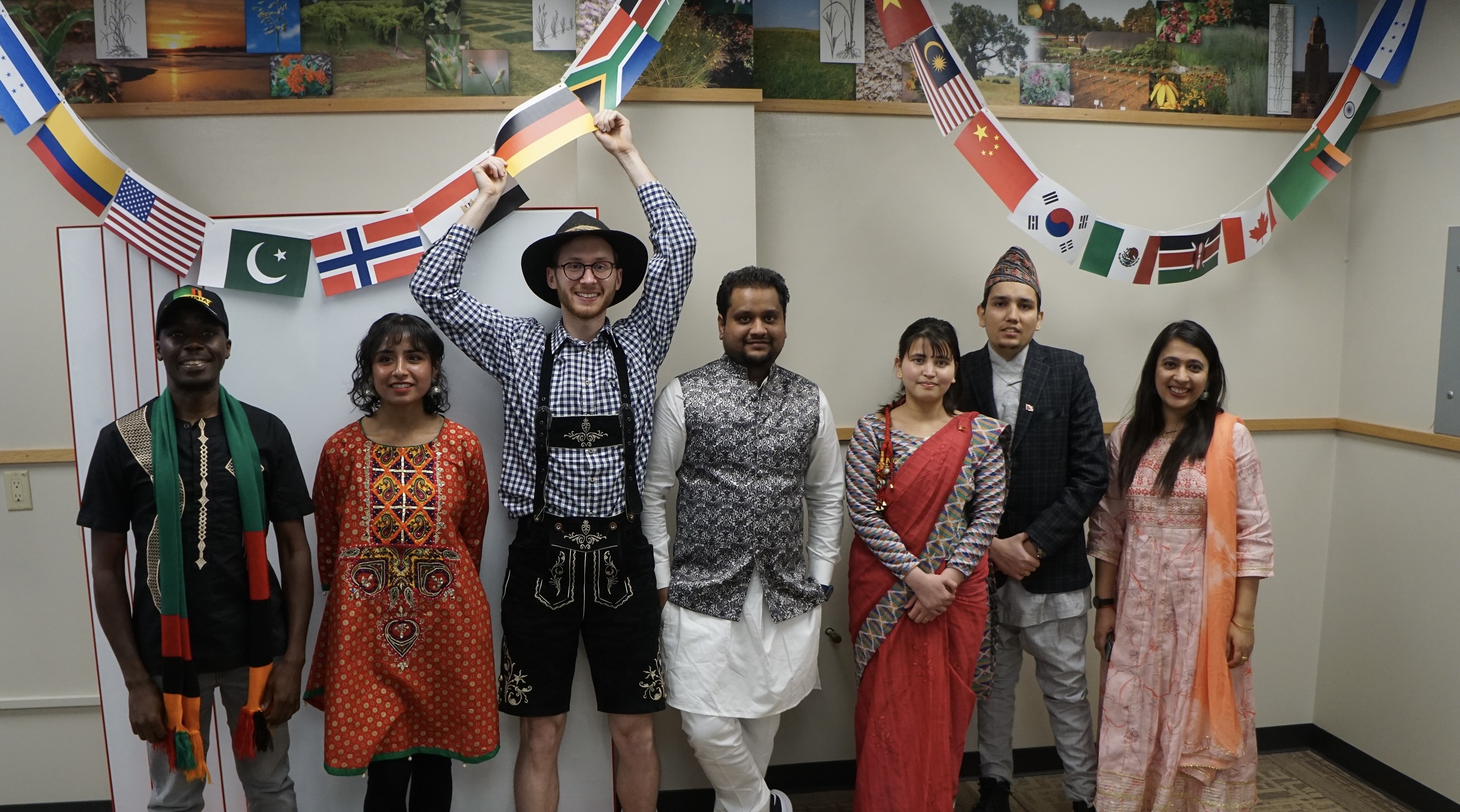 Plant Pathology graduate students in traditional clothing at International Food Night